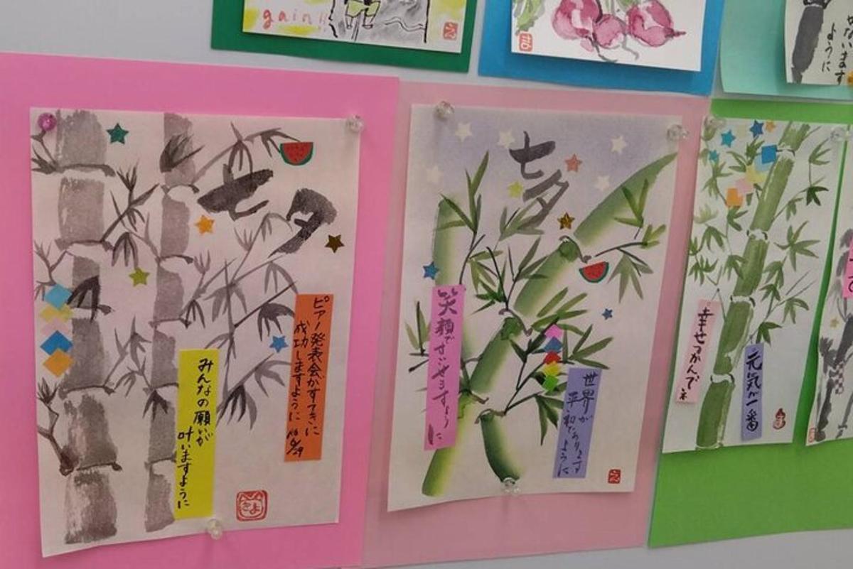 a group of paintings of plants on a wall