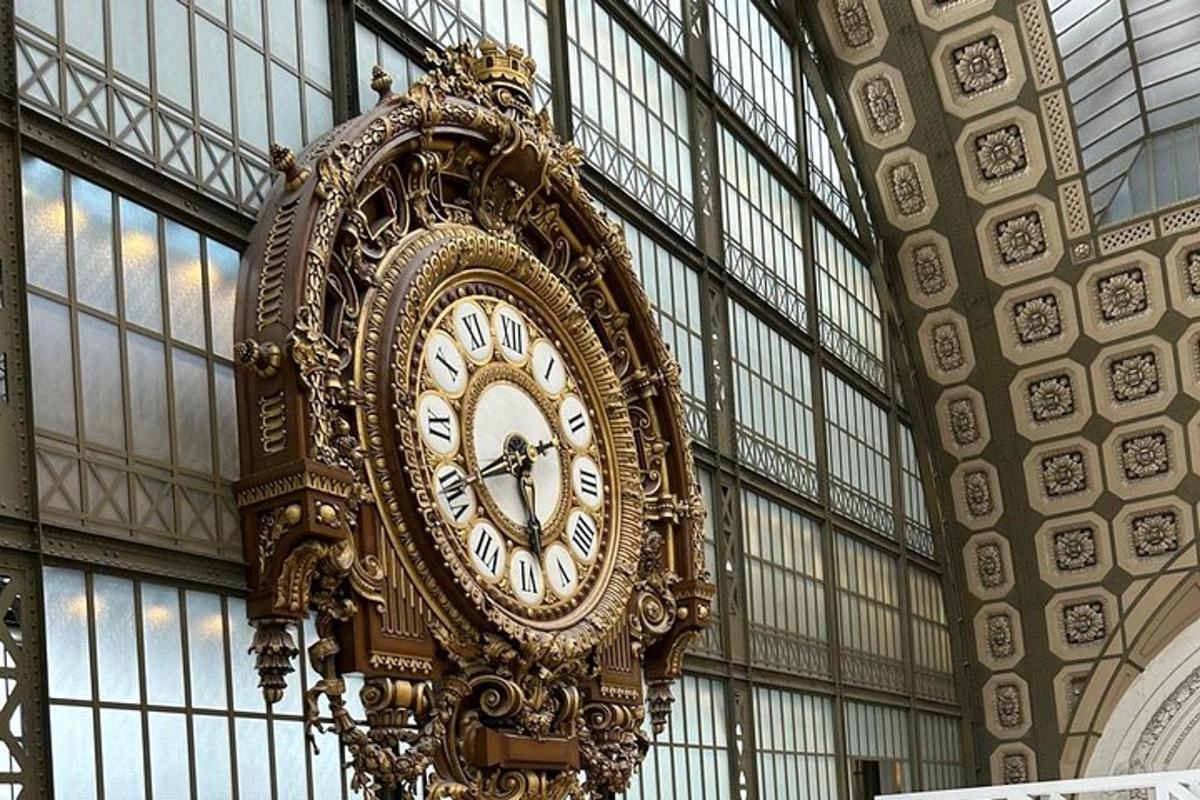 a large clock hanging from the side of a building