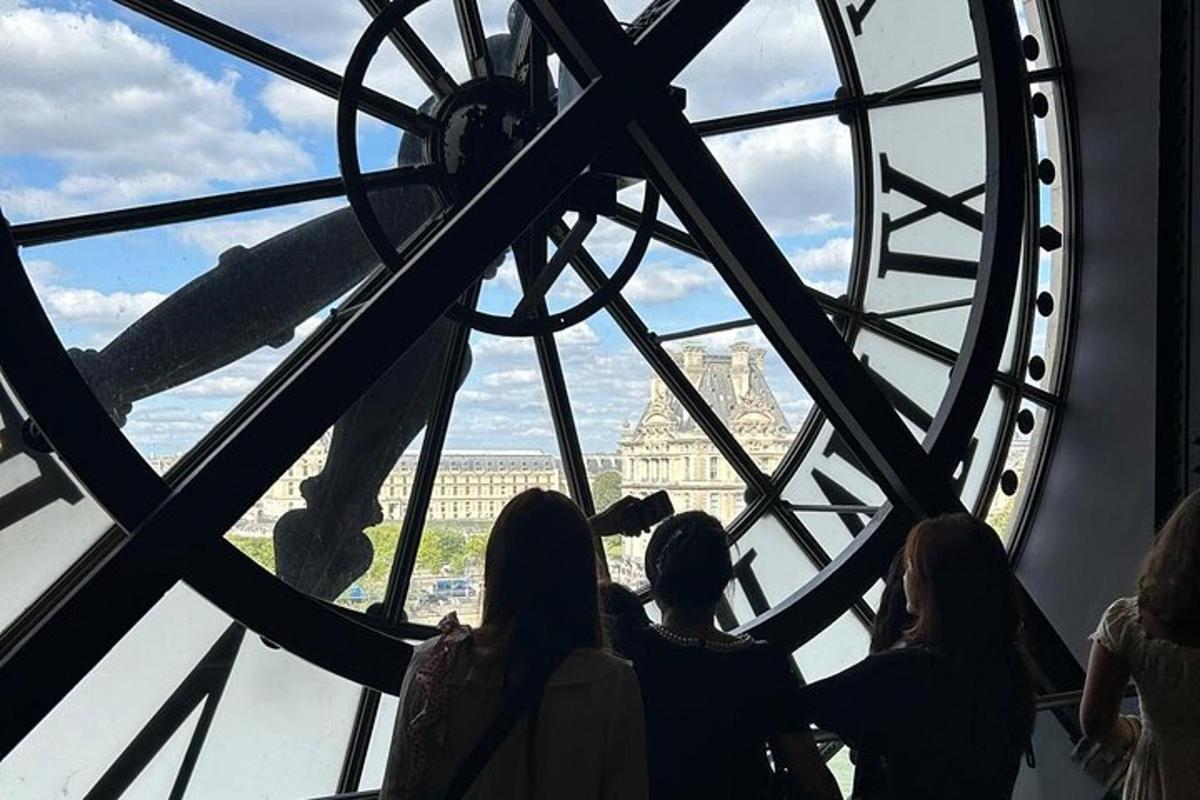 a group of people looking out of a clock tower
