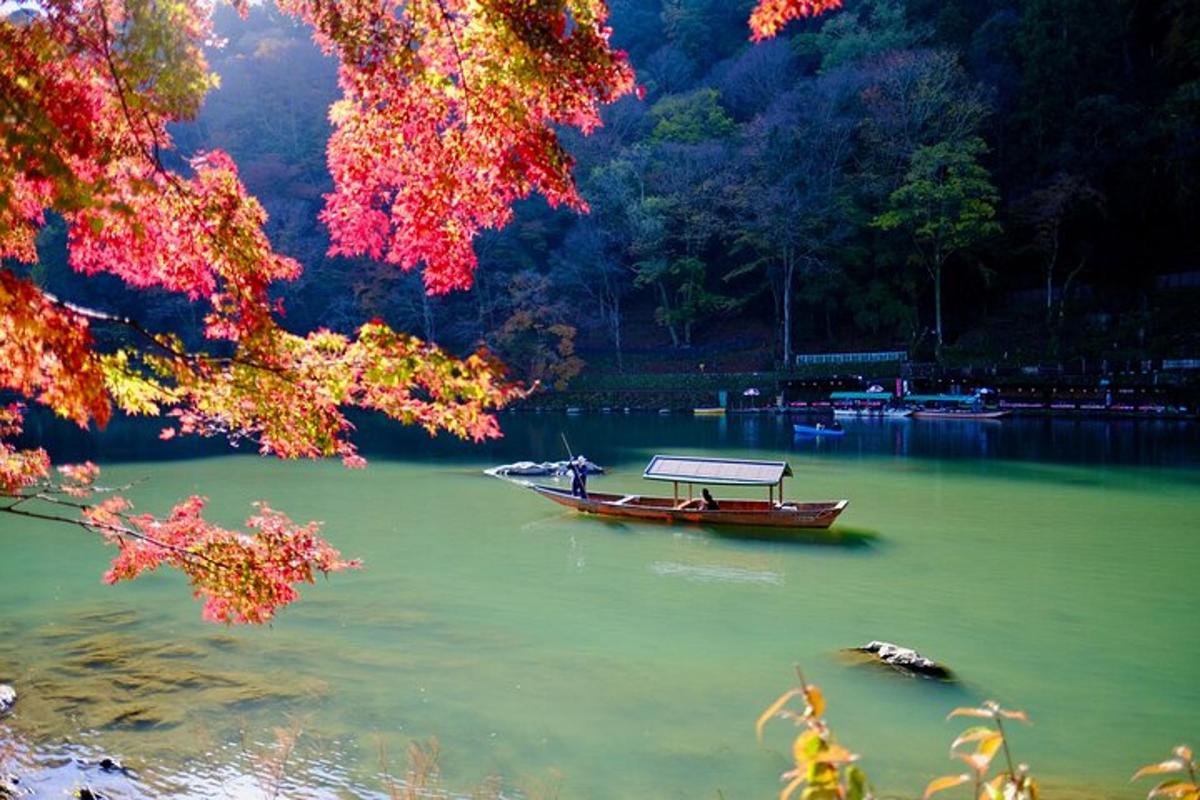 a boat on a lake with trees in the background