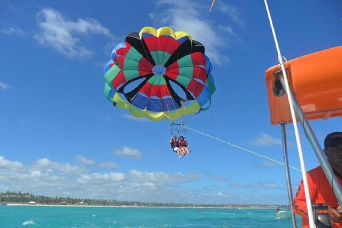 a colorful umbrella on a boat in the ocean