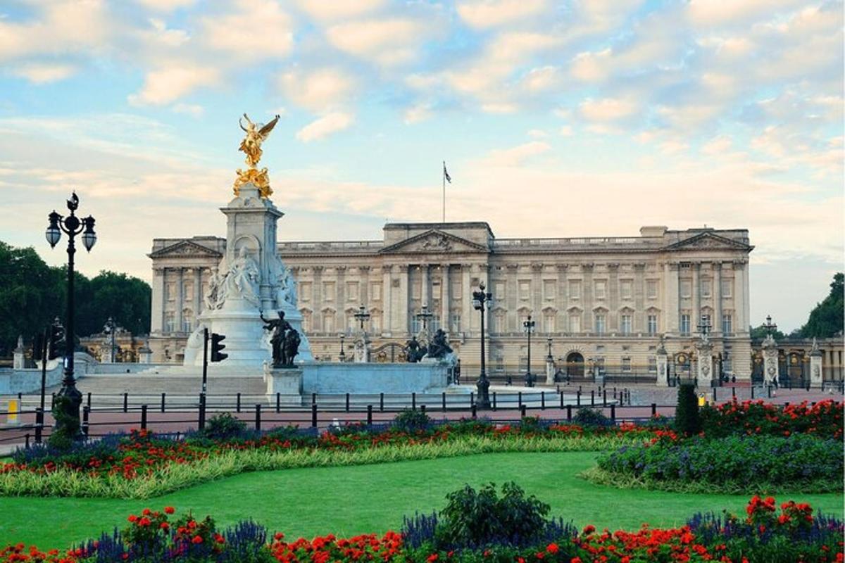 a large building with a statue in front of it