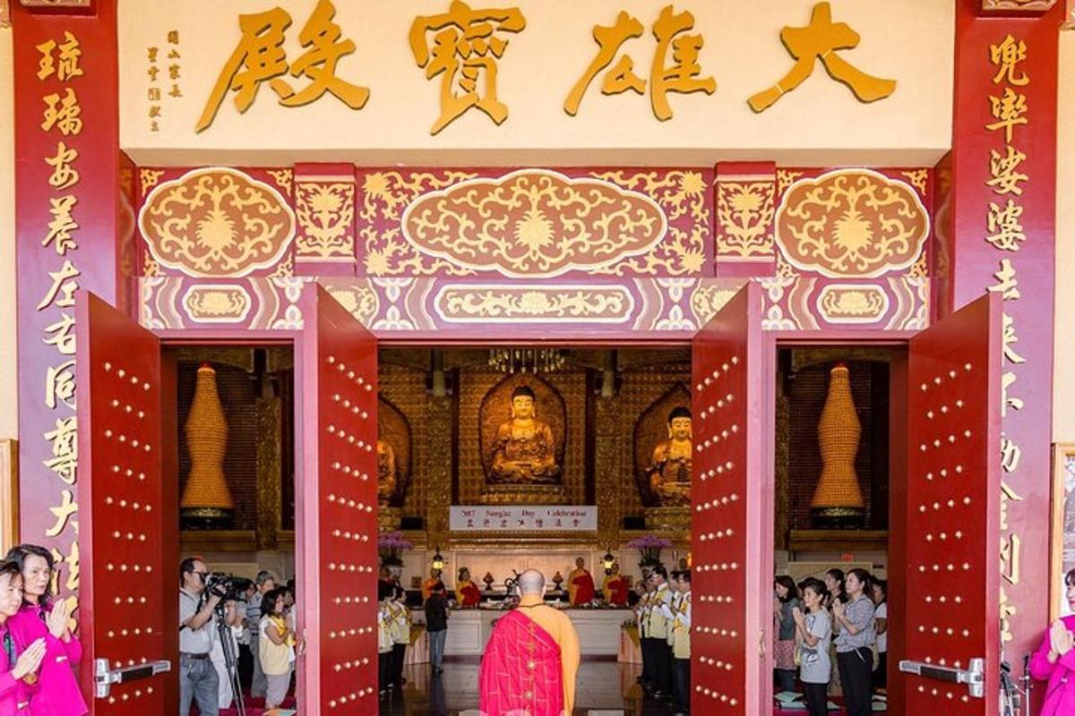 a group of people standing in front of a temple