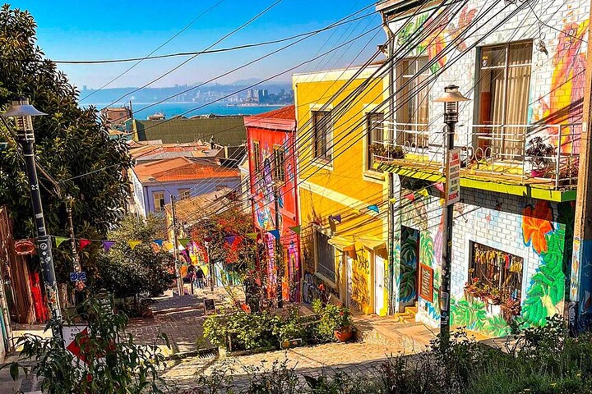 a view of a street with buildings with colorful paint