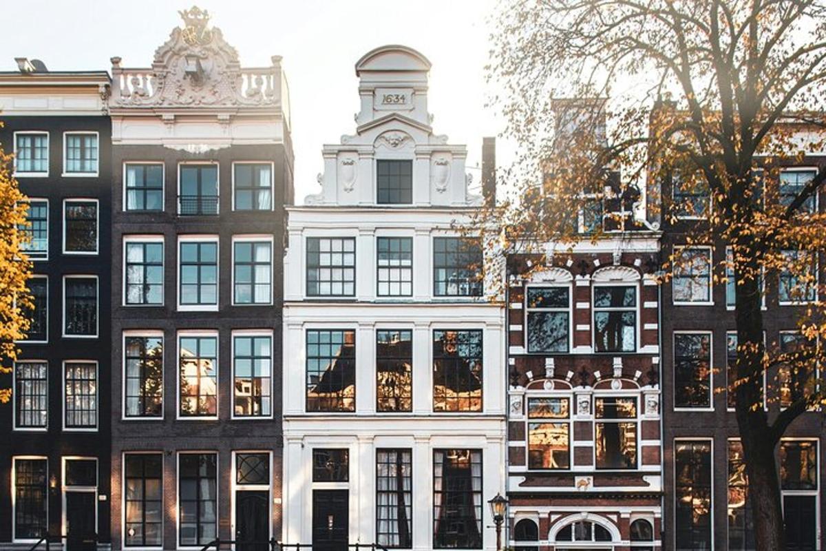 a large building with many windows on a city street
