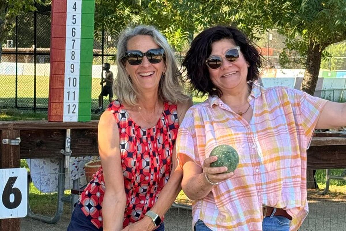 two women are standing next to each other
