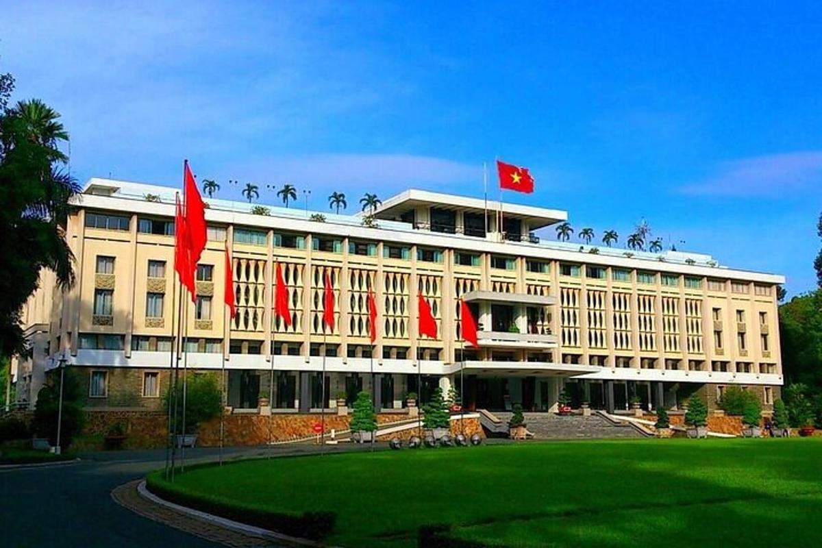 a building with red flags on top of it