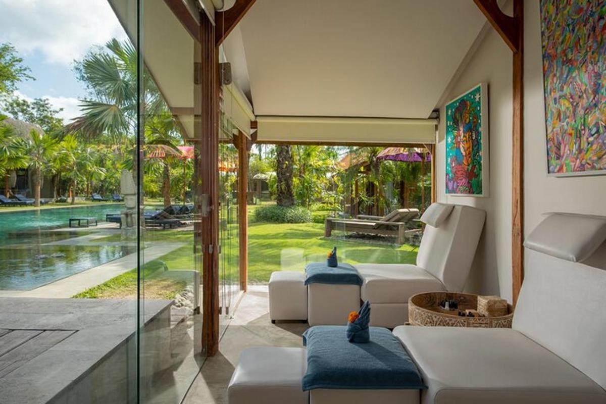 a living room with a view of a pool