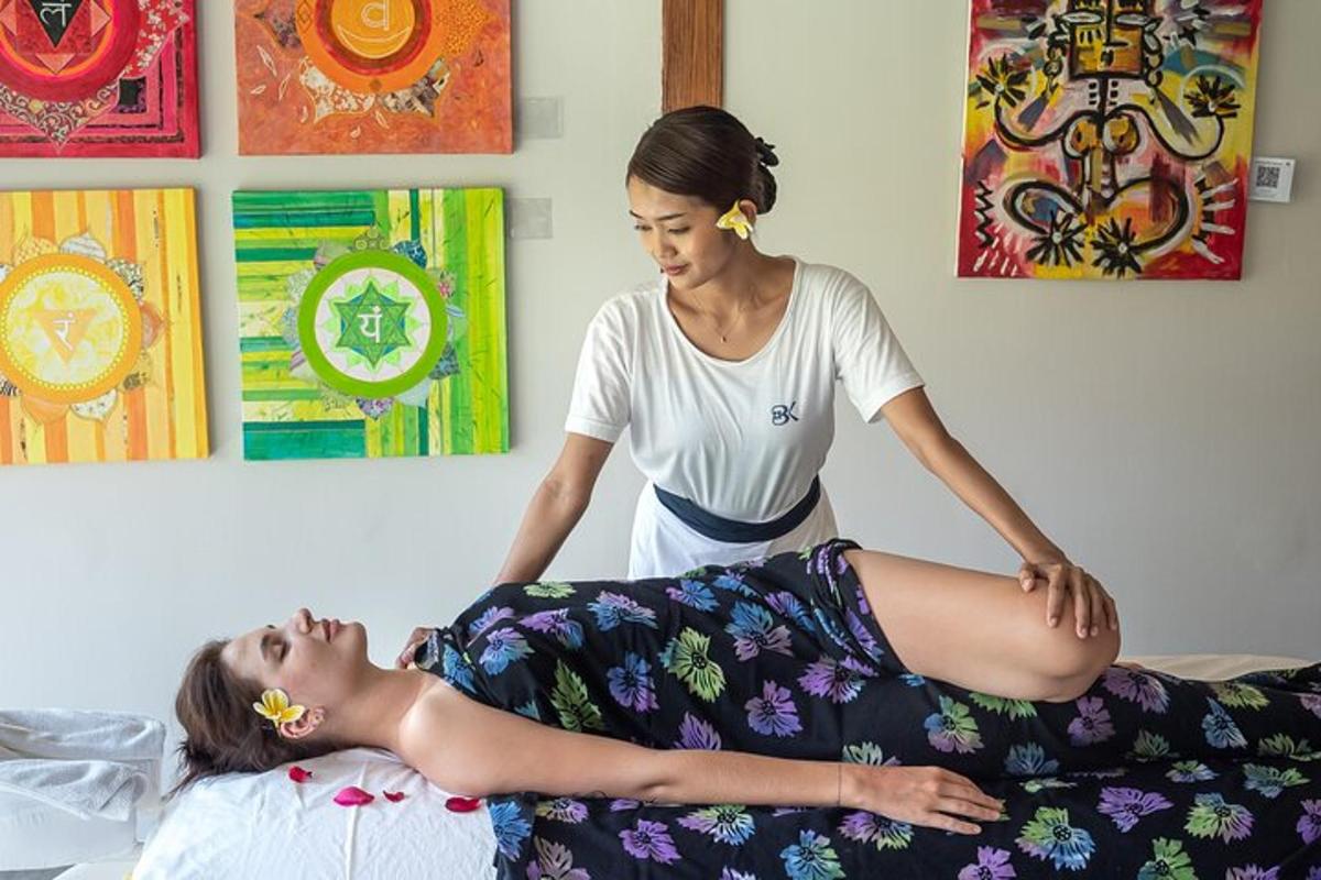 a woman getting a massage from a therapist