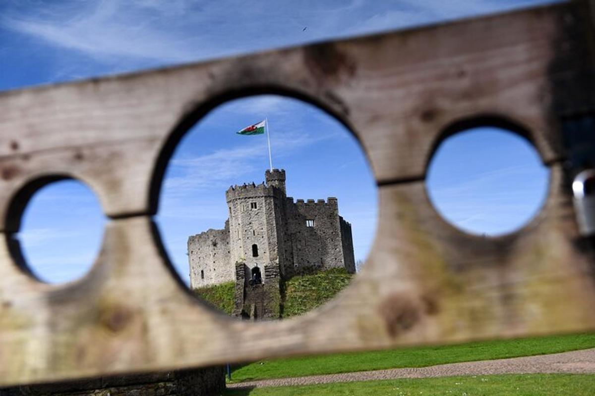 a view of a castle through a fence