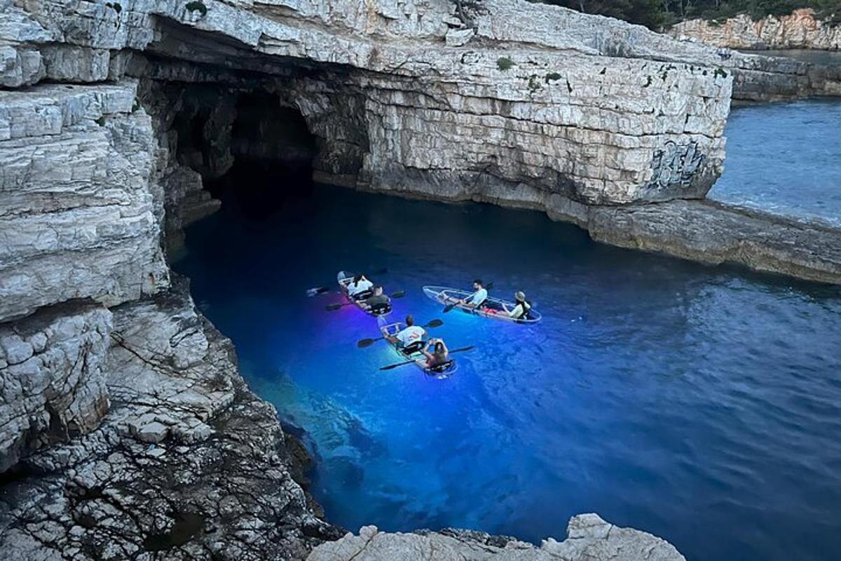 a group of people in boats in a body of water