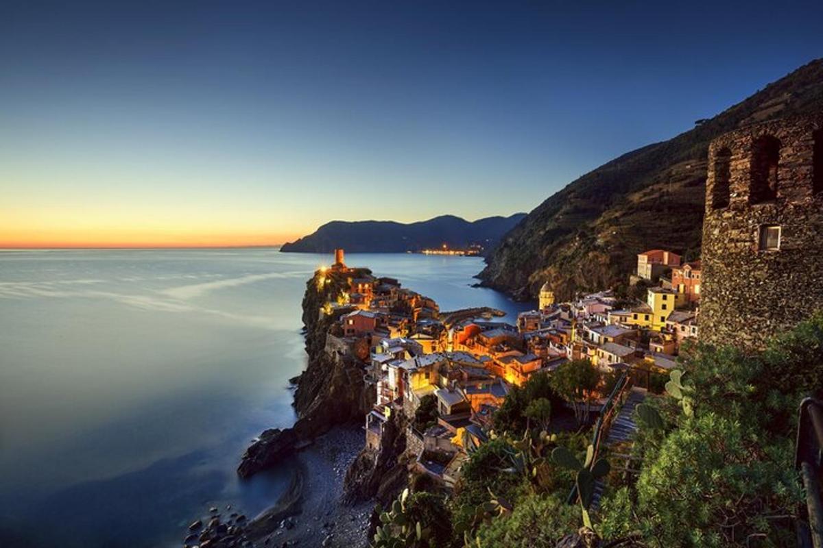 an aerial view of a town on a cliff