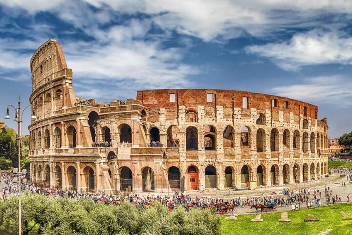 a large building with a lot of people standing around it