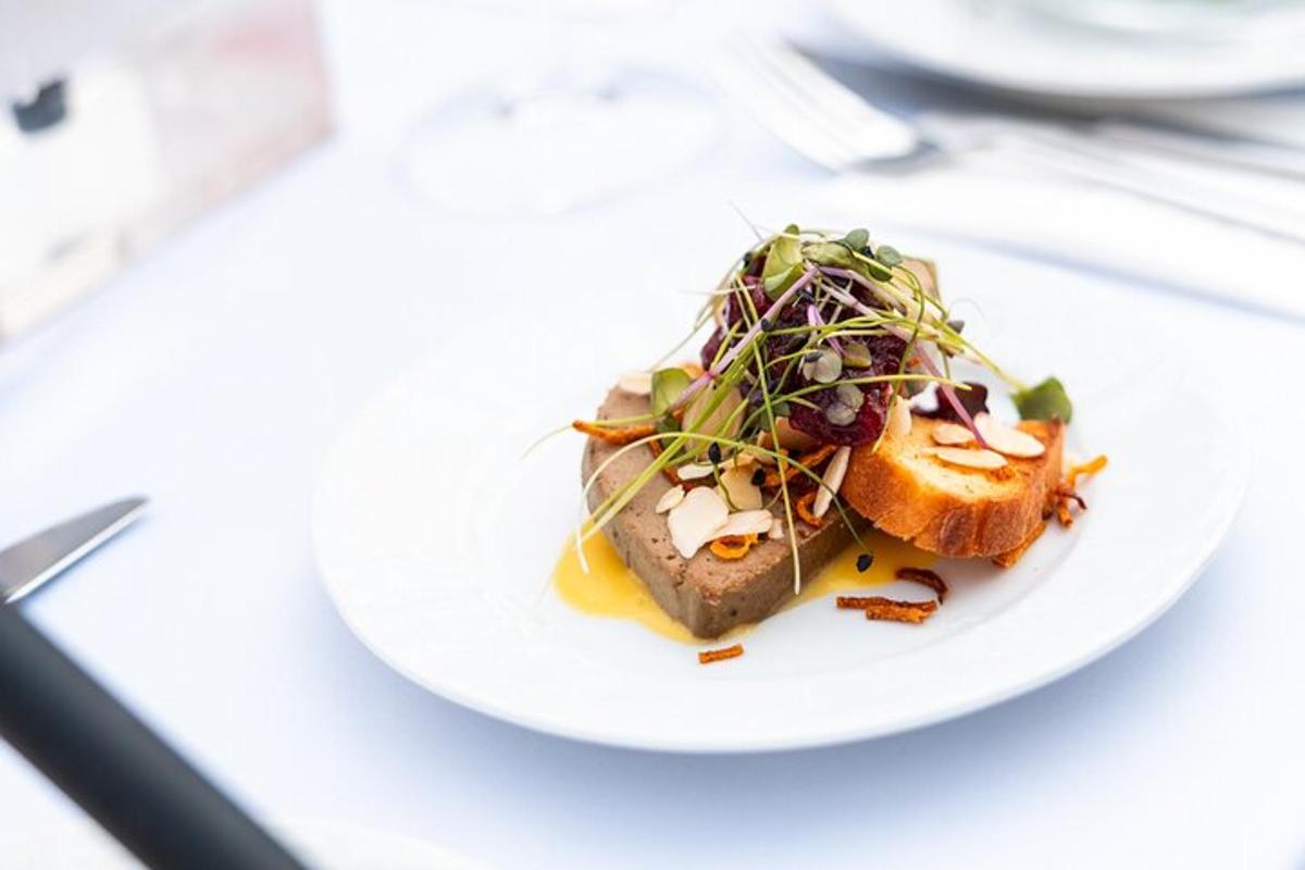 a white plate with food on a table