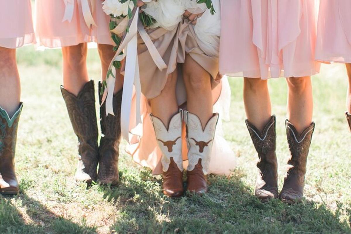 a group of four legs in cowboy boots