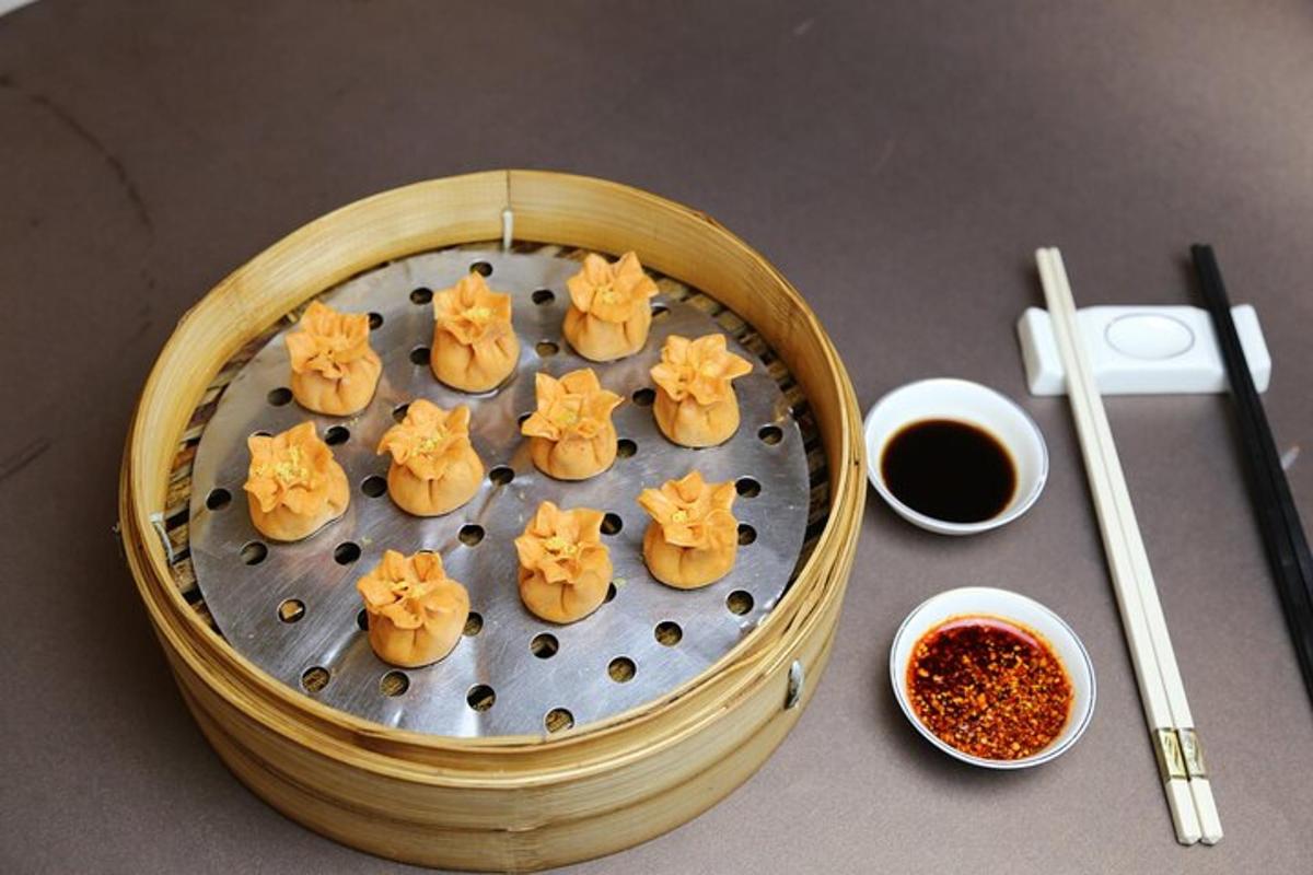 a metal plate with cookies in the shape of cats