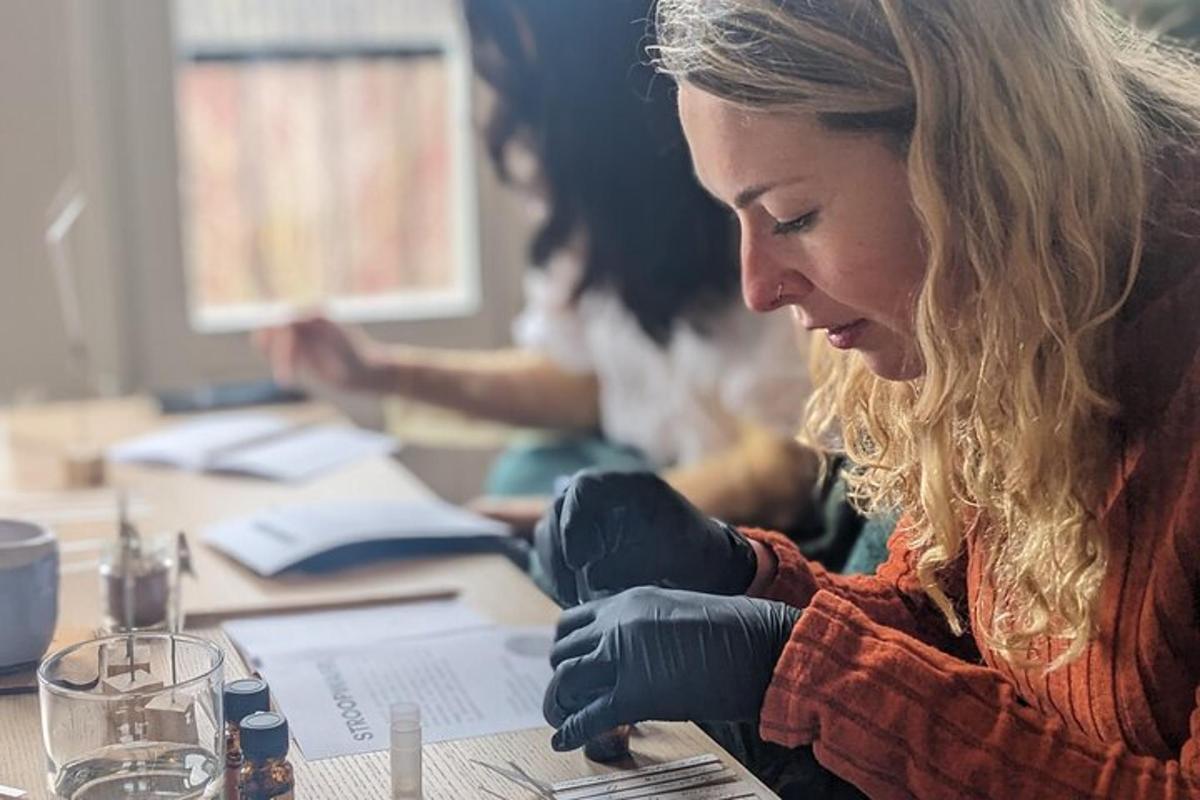 a woman in gloves sitting at a table