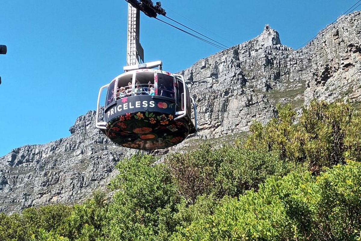 a cable car in front of a mountain