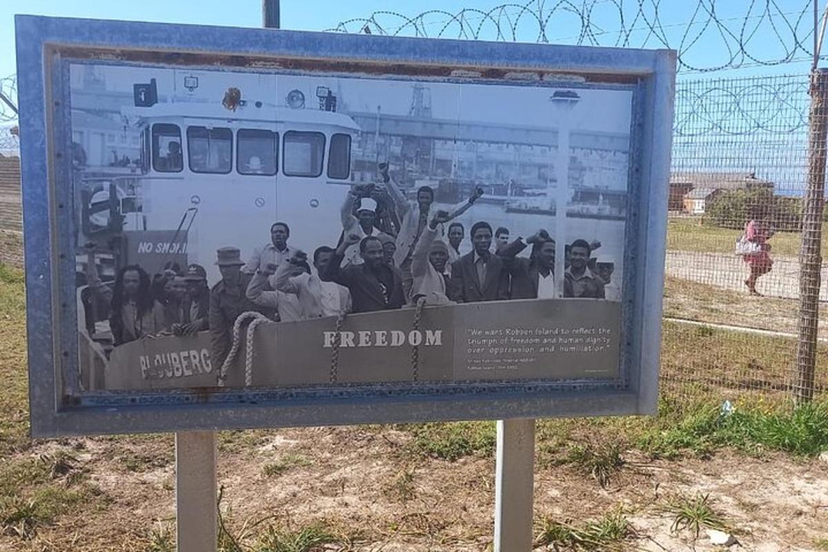 a sign with a picture of a group of people
