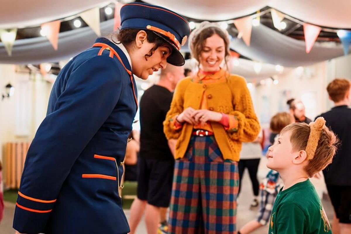 a woman in uniform standing next to a little girl