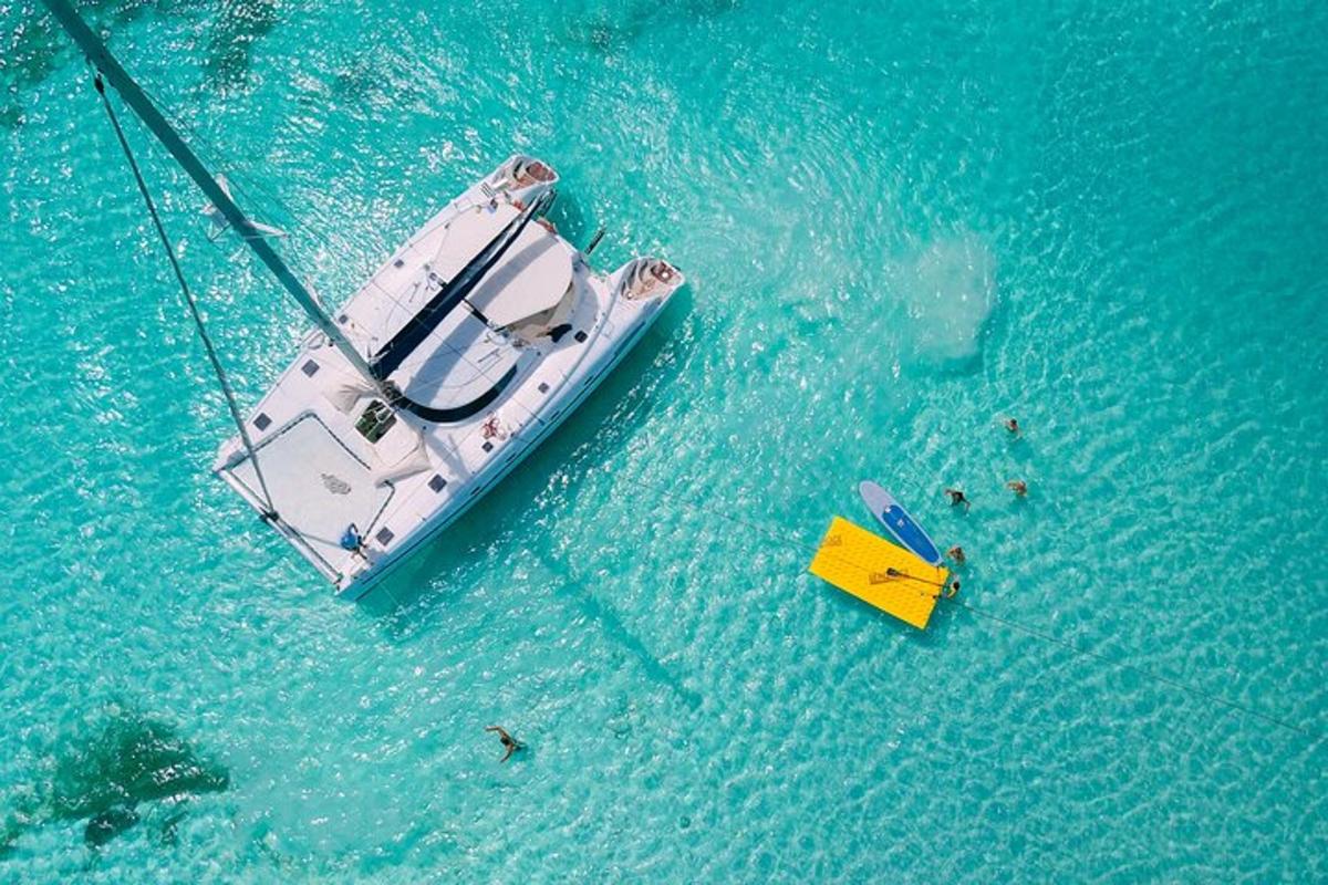 a boat in the water with a group of people