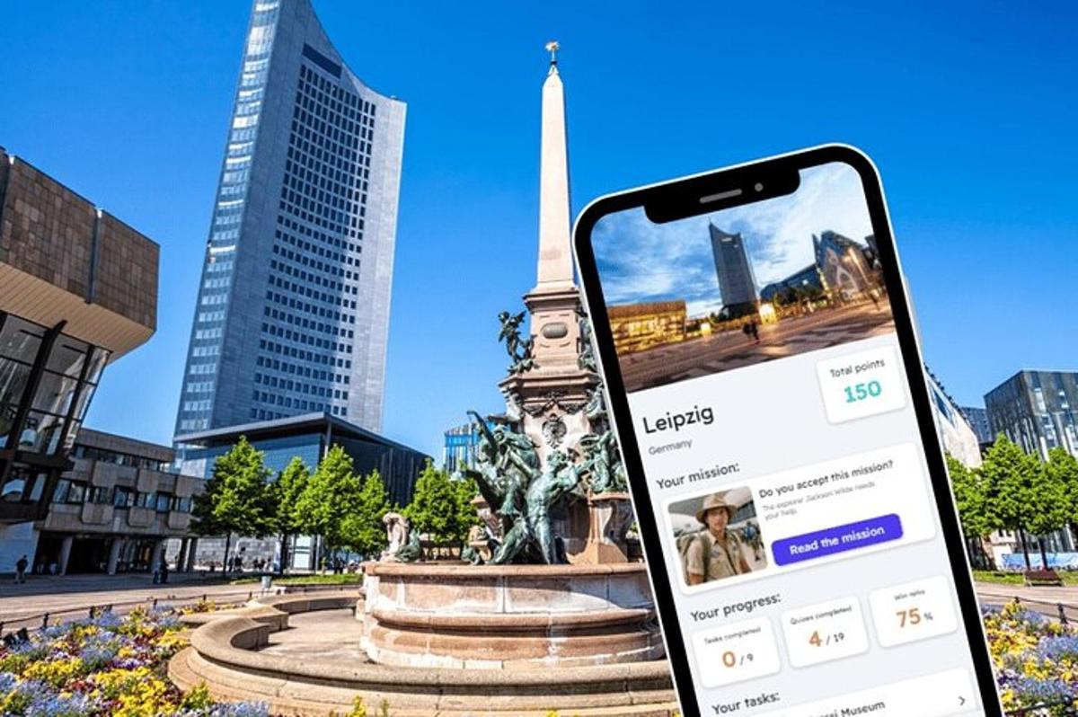 a cell phone in front of a statue in a city