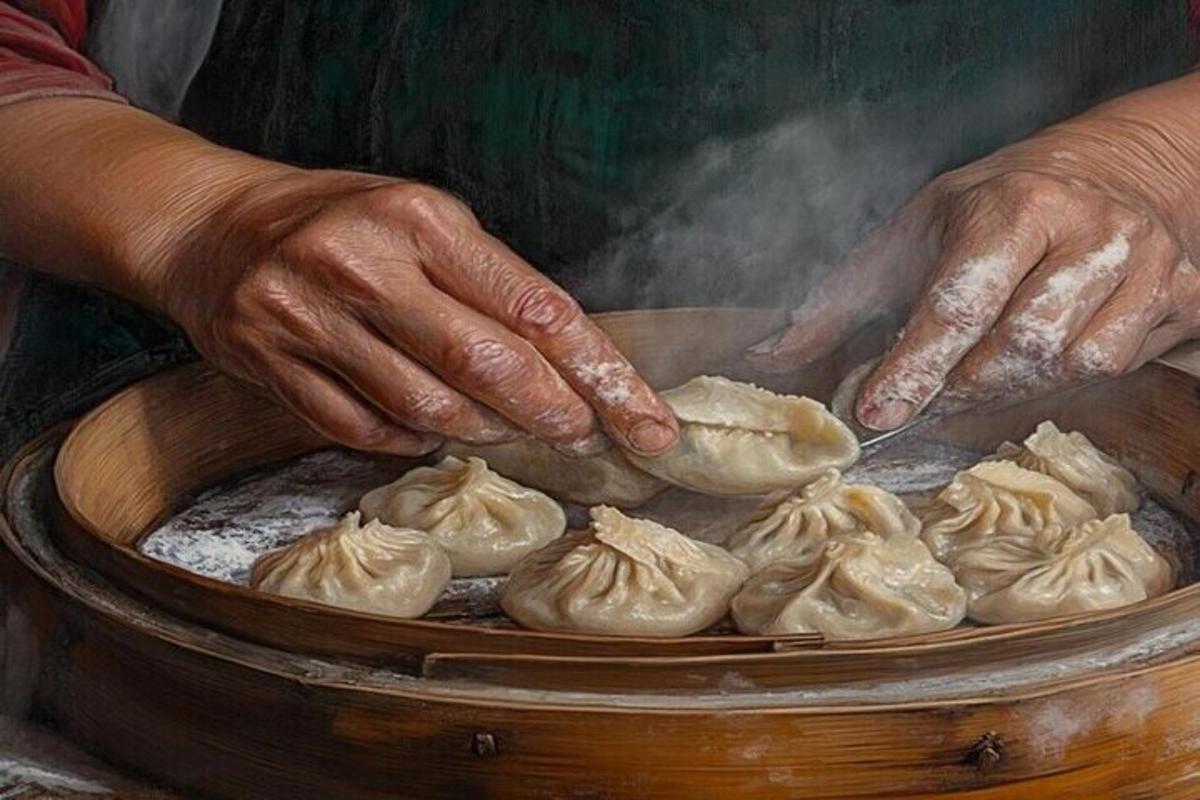a person is making dumplings in a bowl