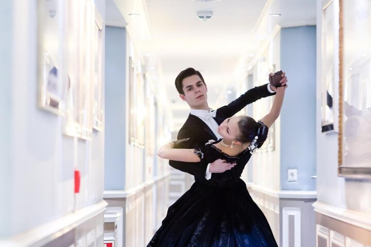 a man and a woman dancing in a room