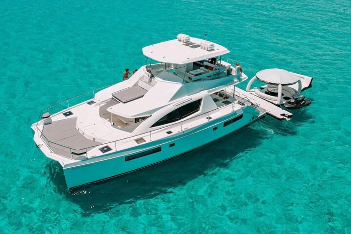 a boat sitting in the water in the ocean