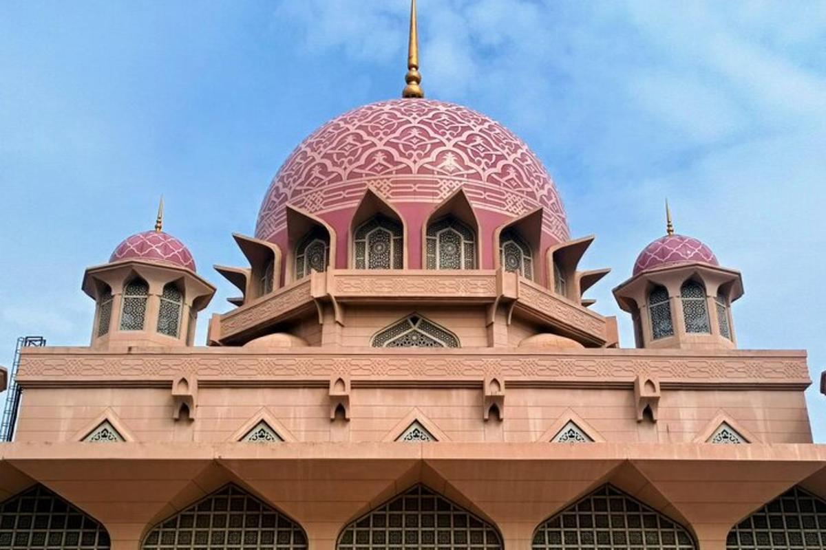 a mosque with two domes on top of it