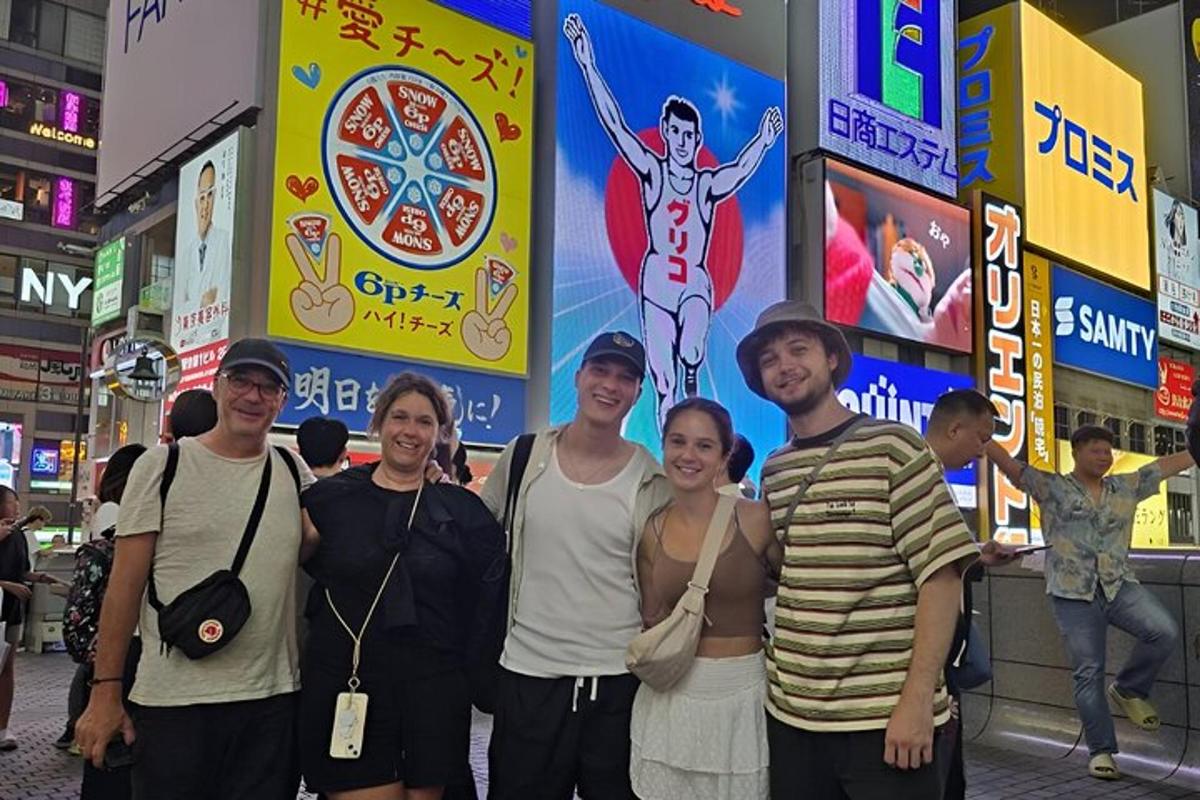 a group of people standing in front of a sign