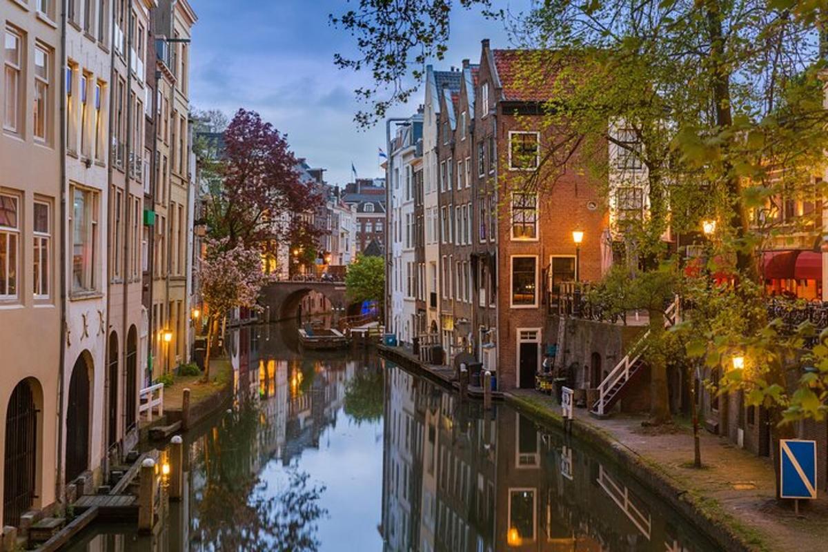 a view of a canal in a city at night