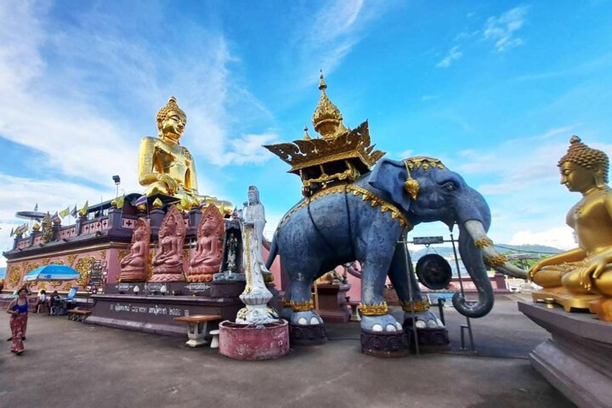 a statue of an elephant in front of a building