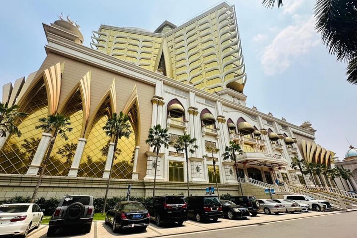 a large building with cars parked in front of it