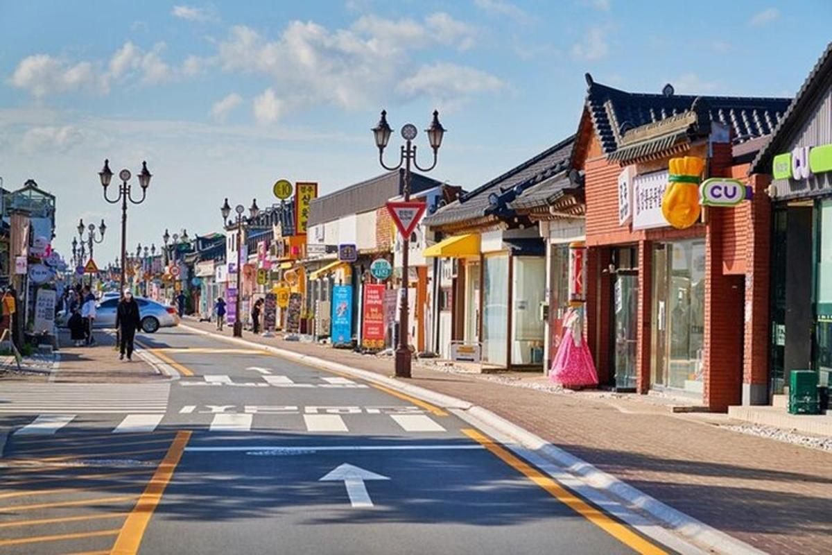 a street in a town with shops and buildings
