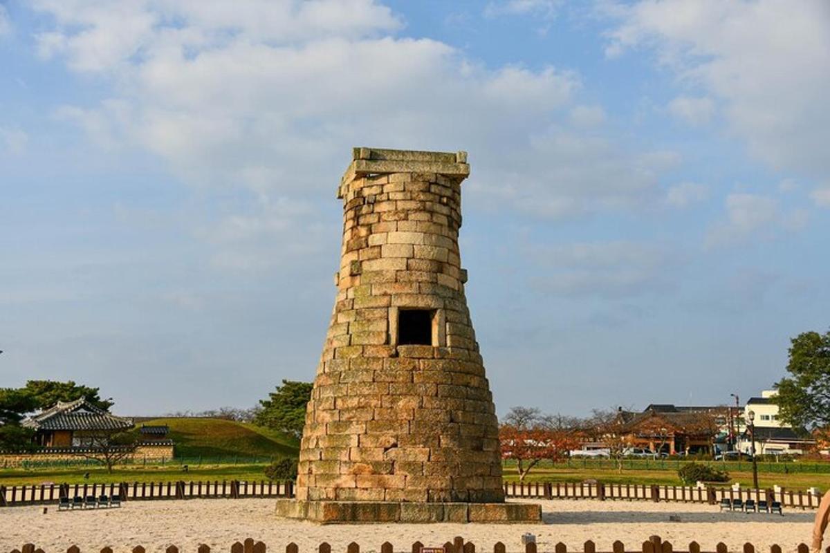 a brick tower with a hole in the middle