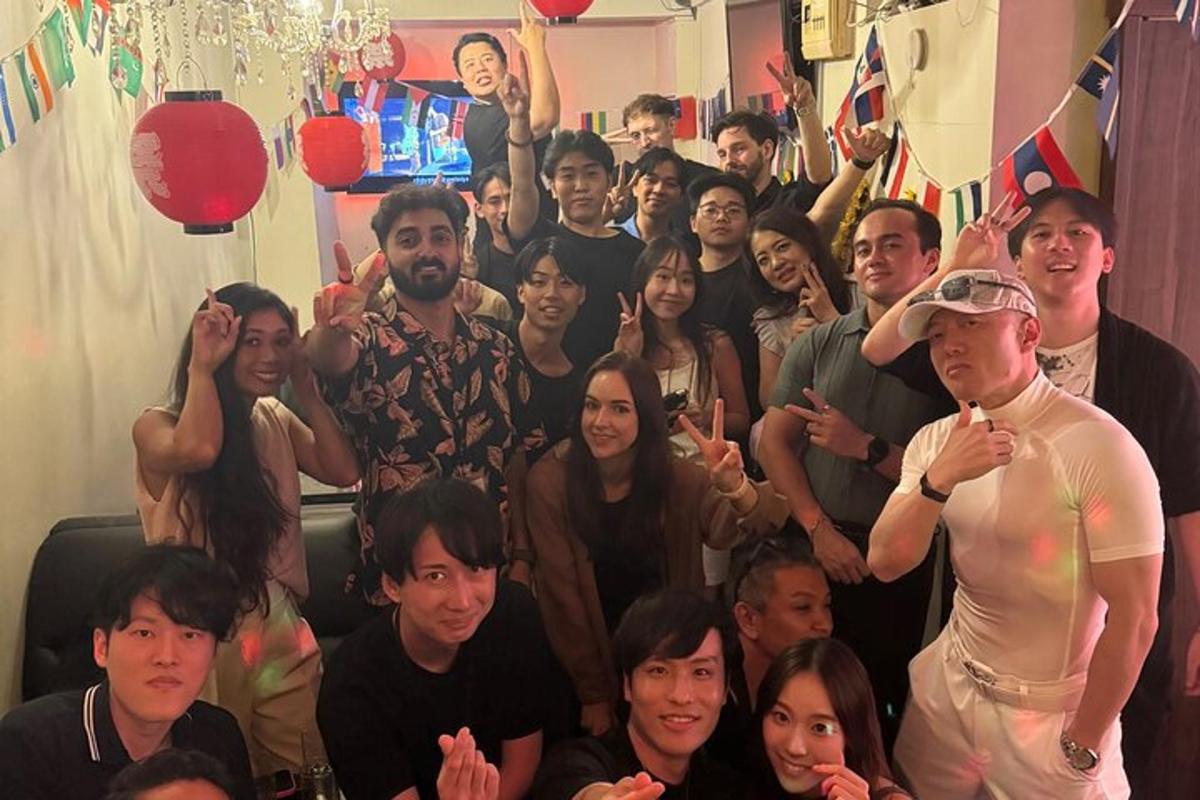 a group of people are posing for a picture