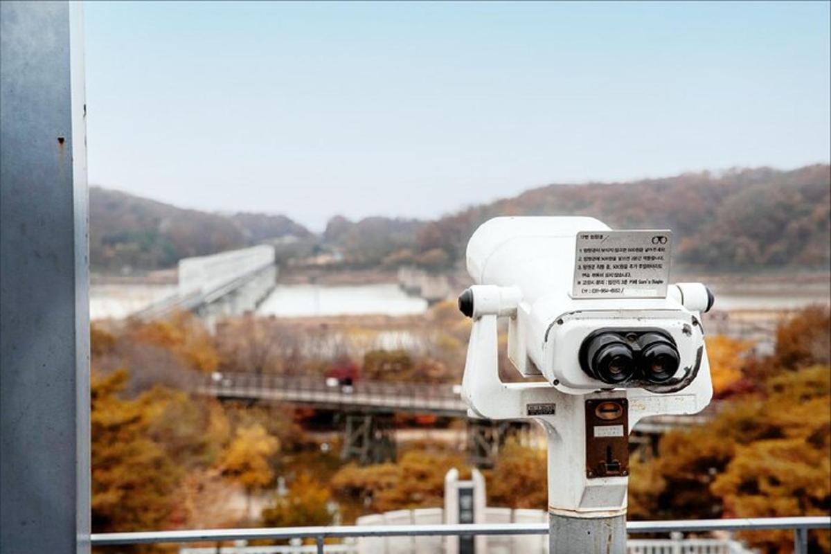 a camera on a pole in front of a building