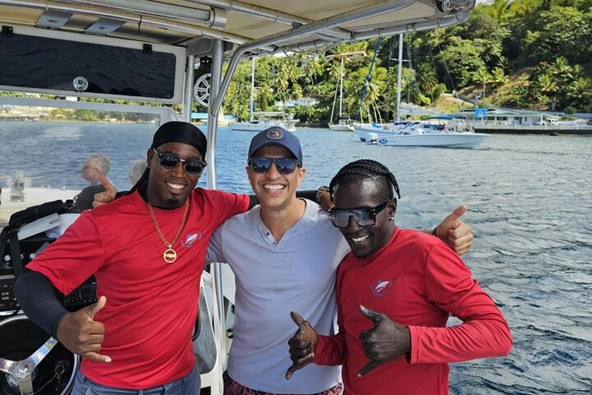 two men giving thumbs up on a boat