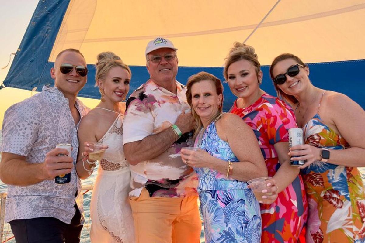a group of people posing for a picture at a party