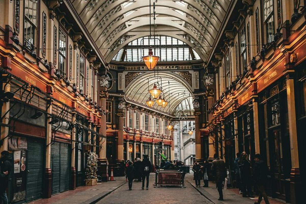 a hallway in a building with people walking through it