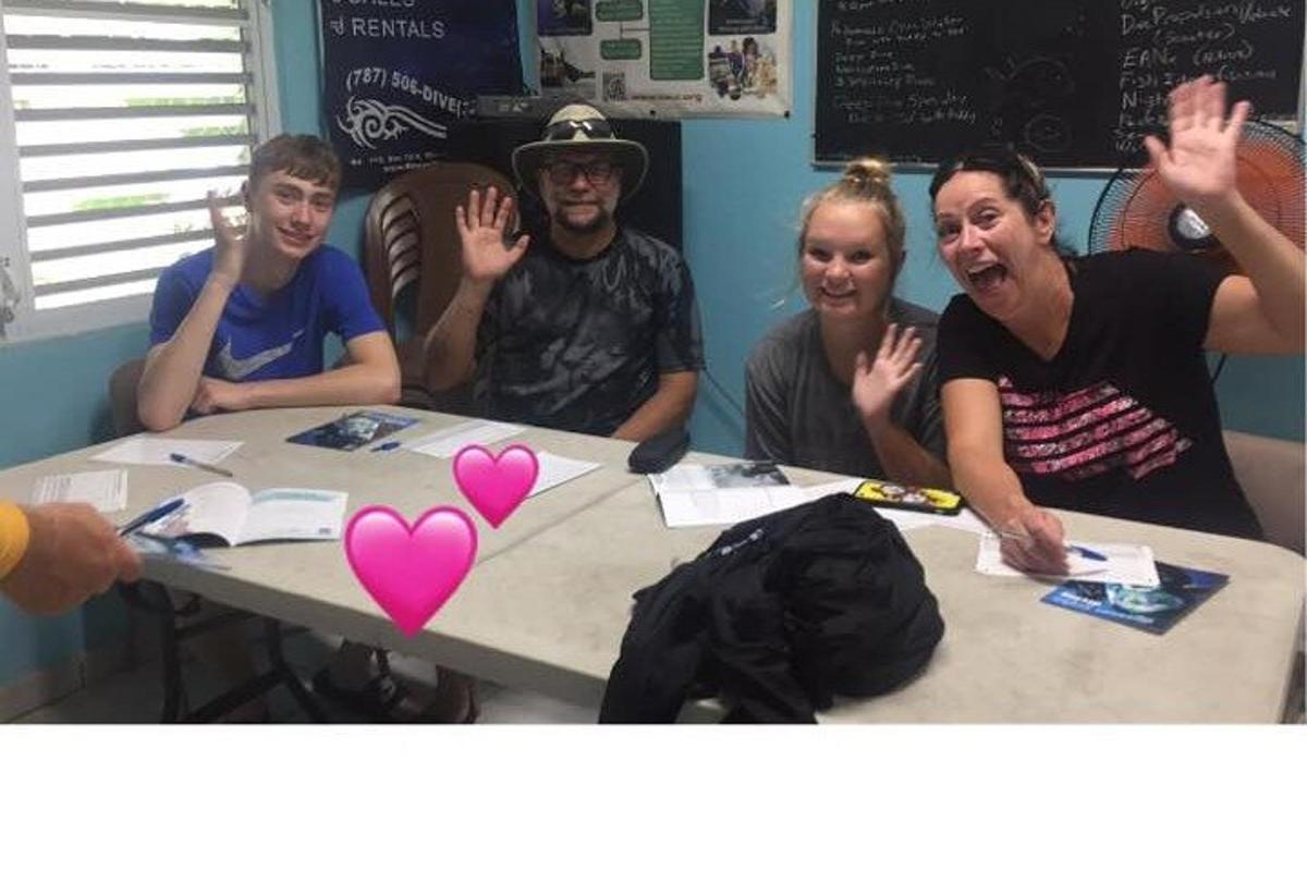 a group of people sitting at a table