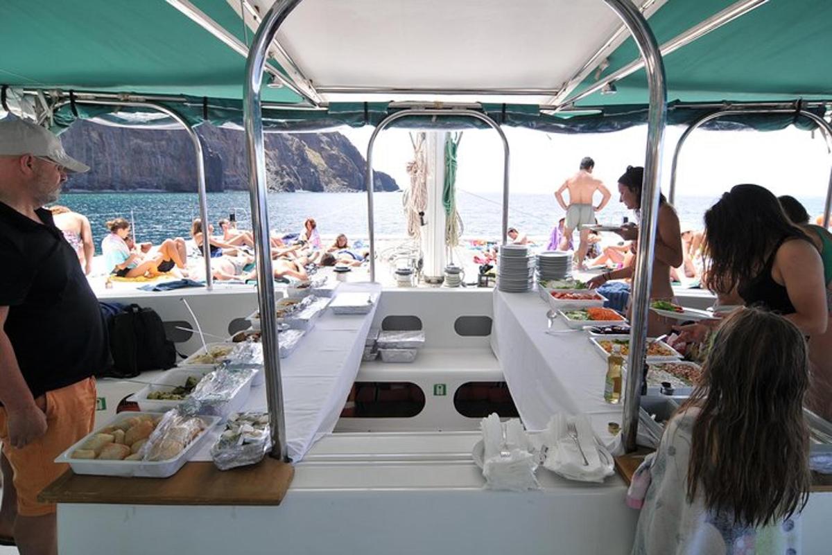 a group of people on a boat eating food
