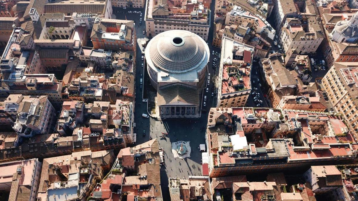 an overhead view of a large building in a city