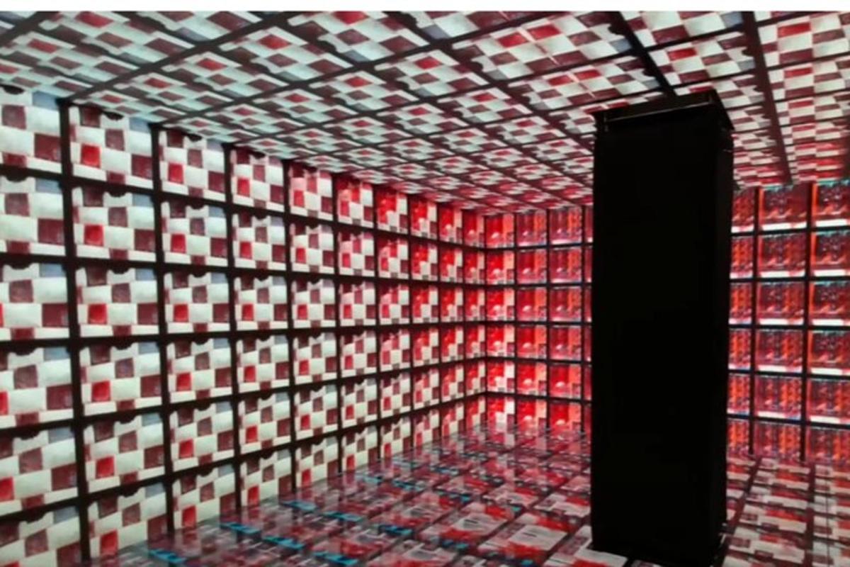 a room with a red and white patterned wall