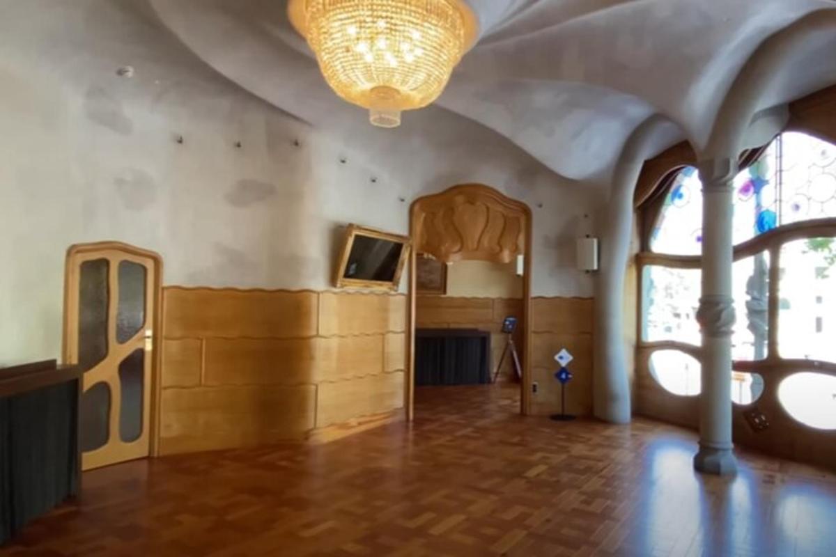 a living room with a large room with a large window
