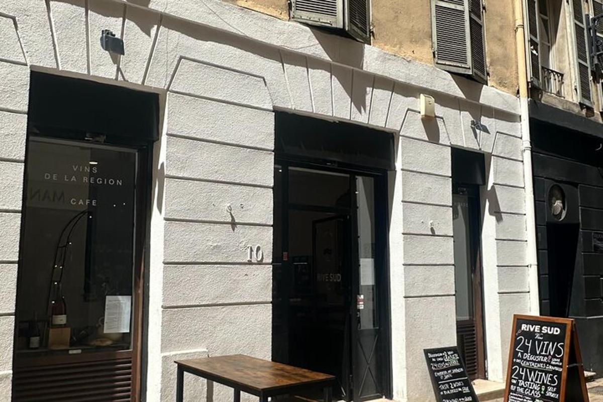 a building with a wooden table in front of it