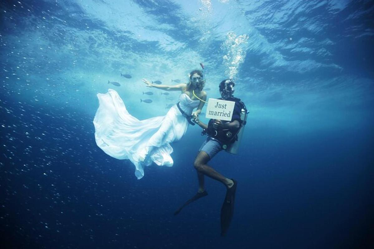 a man and a woman swimming in the water