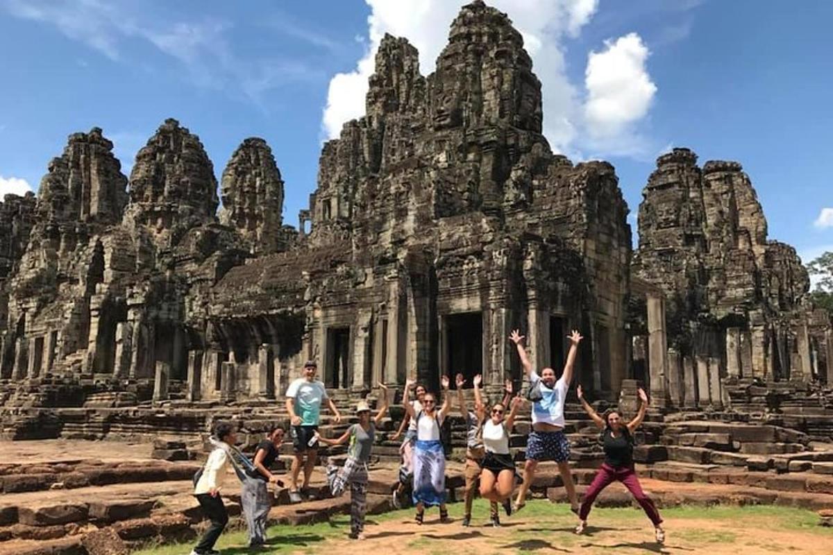 a group of people standing in front of a temple