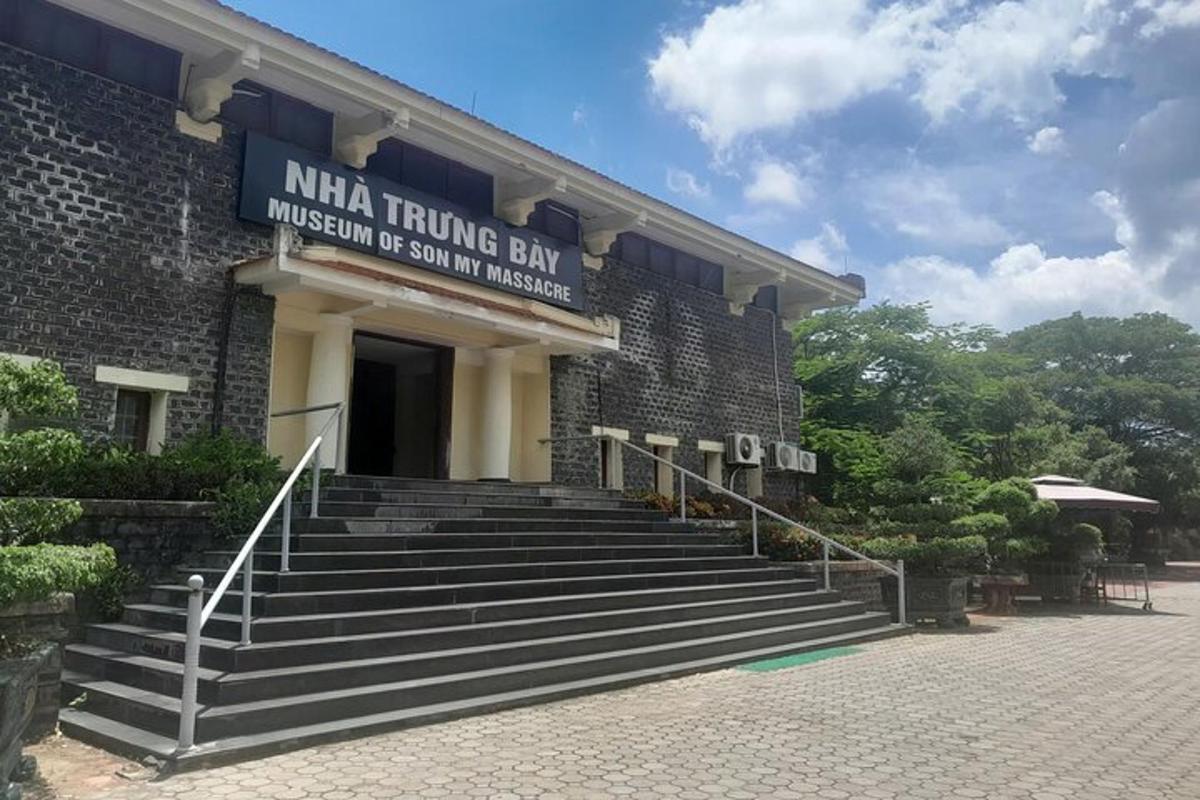 a building with stairs in front of a building